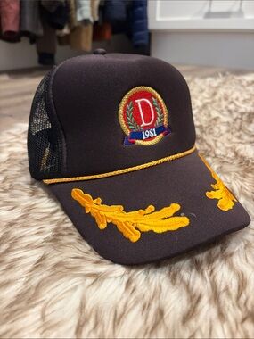Danzy Black Trucker Cap with Gold Embroidery and Red Crest